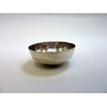 A SILVER BOWL, Barker Brothers, Chester 1908, rounded form and hammered finish, 11.5cm diameter,