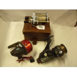 A HARDY 'ELAREX' REEL, two further reels and a Carter split cane rod (4)