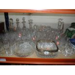 A QUANTITY OF CUT GLASS, to include silver rimmed bowl, decanters etc