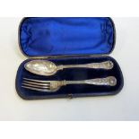 A CASED VICTORIAN SILVER CHRISTENING SET, London 1868, comprising a fork and spoon moulded and