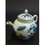 A WORCESTER FIRST PERIOD TEAPOT AND COVER, circa 1770-80, of globe shape with plain loop handle,