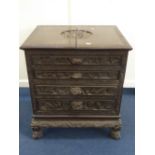 A CHINESE CARVED HARDWOOD CANTEEN CABINET, early 20th Century, having a hinged open top and one