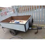 A SINGLE AXLE CAR TRAILER, approximate external size 196cm x 125cm, with spare wheel and trailer