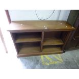 A LOW OAK OPEN BOOKCASE