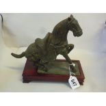 A CHINESE REPRODUCTION TANG STYLE BRONZE FIGURE OF A HORSE, 20th Century, modelled rearing with