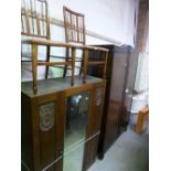 AN OAK TWO DOOR WARDROBE, and a pair of Edwardian mahogany inlaid bedroom chairs (key) (3)