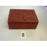 A CHINESE CINNABAR LACQUER BOX AND COVER, 19th/20th Century, of rectangular form, the cover with