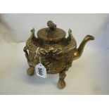 A REPRODUCTION CHINESE TEA KETTLE, modelled in the Ming style, the double-dragon swing handle