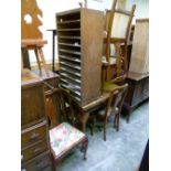 A WALNUT EXTENDING DINING TABLE, and six chairs including two carvers (7)