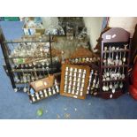 VARIOUS DISPLAY STANDS, with collection of thimbles and spoons