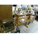 AN OVAL MIRROR, eight various table lamps with shades, brass magazine rack, wicker open bookcase etc