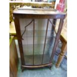 A WALNUT GLAZED SINGLE DOOR CHINA CABINET, (s.d.)