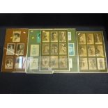 A COLLECTION OF 23 PHOTOGRAPHICL POSTCARDS OF SHOWGIRLS, early 20th Century, some signed in ink,