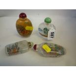 FOUR CHINESE GLASS SNUFF BOTTLES, 20th Century, internally painted with landscape scenes,