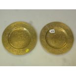 A PAIR OF CHINESE BRASS DISHES, Republic period, of circular shape and incised with dragons amid
