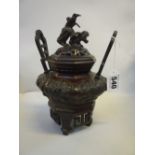 A CHINESE BRONZE CENSER AND COVER, 20th Century, of octagonal compressed baluster form, twin bracket