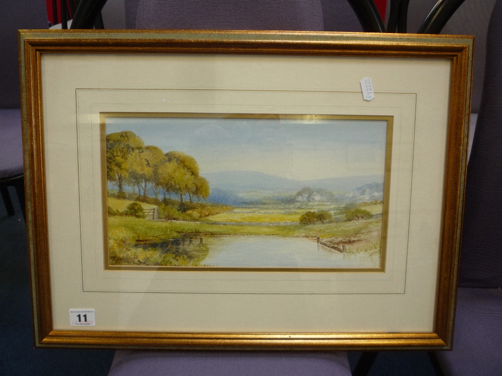 M. WHITEHEAD, 1920's, an English rural landscape in summer with pond before hills, watercolour,