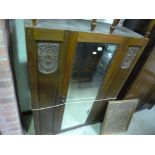 AN OAK MIRRORED SINGLE DOOR WARDROBE, (missing base and cornice)