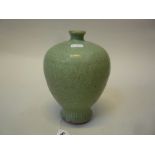 A CHINESE LONGQUAN VASE, Meiping, the body incised with stylised flowers and foliage under a celadon