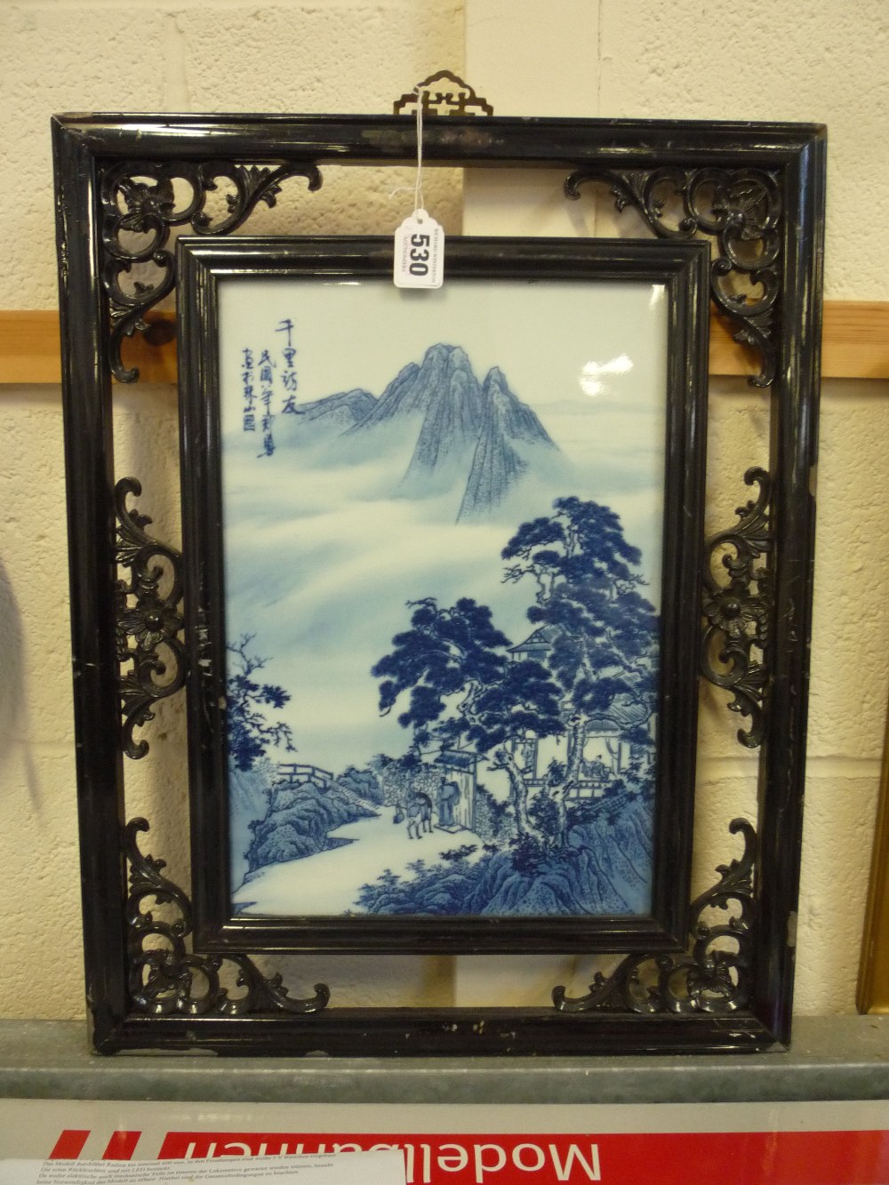 A CHINESE BLUE AND WHITE PORCELAIN PANEL, Republic period, decorated with a misty mountain view with