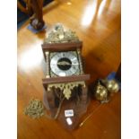 A DUTCH STYLE WALL CLOCK, (pendulum and two brass weights) and a box of various pictures (2)