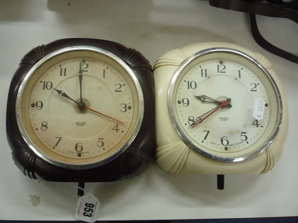 A PAIR OF SMITHS ART DECO BAKELITE WALL CLOCKS, moulded square cases in brown and white (2)