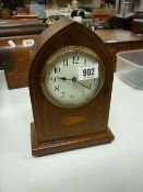 AN EDWARDIAN INLAID MAHOGANY MANTEL CLOCK, French spring driven movement