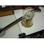 A DOMED KUNDO CLOCK, a silver mounted walking stick and a shooting stick (3)