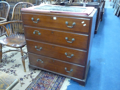 A GEORGIAN OAK CHEST, of four long drawers with caddy top and bracket feet supports