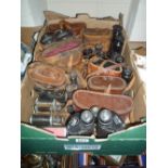 A TRAY OF VARIOUS BINOCULARS, (some cased)