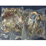 TWO BAGS OF COSTUME JEWELLERY