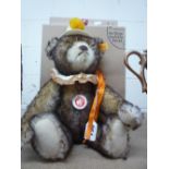 A BOXED STEIFF CLASSIC CLOWN BEAR, brown tipped mohair and yellow pompoms to hat, height