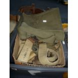A BOX CONTAINING A LARGE NUMBER OF MILITARY ISSUE BELTS AND WEBBING, WWII era, with an almost