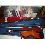 A SELECTION OF MUSIC TUITION AND SONG BOOKS, with some music accessories and an Article violin