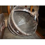 A COOPERED WELL BUCKET, with iron fitments