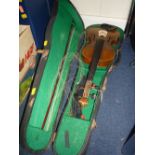 A CASED VIOLIN, with two piece top and back, with flame detailing to back, comes with bow