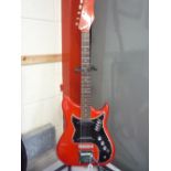 A 1964 BURNS NU SONIC GUITAR, with cherry finish, black scratch plate two single coil pickups and