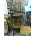 AN OAK BARLEY TWIST GATE LEG TABLE, and five chairs including one carver (6)