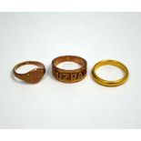 THREE RINGS, the first a plain band, stamped 22ct, together with a 9ct rose gold signet ring and a