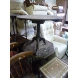 AN OAK OCTAGONAL SHAPED OCCASIONAL TABLE, and a tilt top table (s.d.) (2)