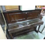 A WALTER SMITH AND CO MAHOGANY UPRIGHT PIANO