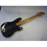 A HONDO II PRECISION BASS COPY GUITAR, black finish and scratch plate with a maple neck