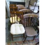 A SET OF FOUR OAK CHAIRS, and three rush seated chairs (7)