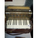 A BARCAROLE ACCORDION, in case