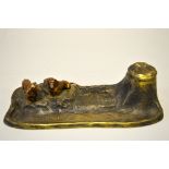 A PAIR OF COLD PAINTED BRONZE DACHSHUNDS, mounted on an inkwell/pen rest, height approximately 24cm