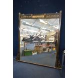 A VICTORIAN EBONISED AND GILT AESTHETIC STYLE OVERMANTLE MIRROR, approximate size height 176cm,