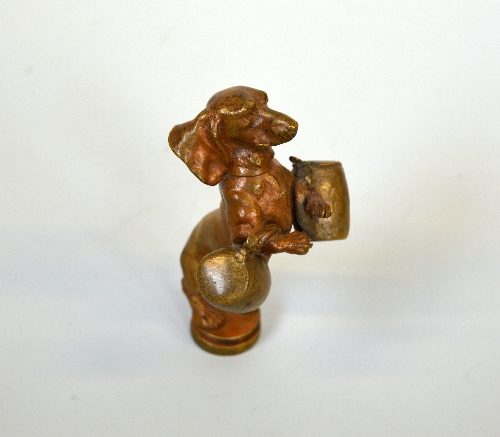 A BRONZE SEAL, modelled as a Dachshund on it's hind legs carrying two tankards, approximate height - Image 2 of 3