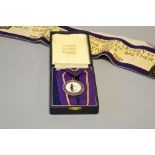 INTERESTING ROYAL MEMORABILIA, with a medal presented to W.H. Leckey by H.R.H. Queen Elizabeth The