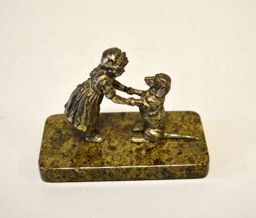 AN AUSTRIAN SILVERED GROUP OF A GIRL AND BEGGING DACHSHUND, on a marble base, height approximately - Image 2 of 2