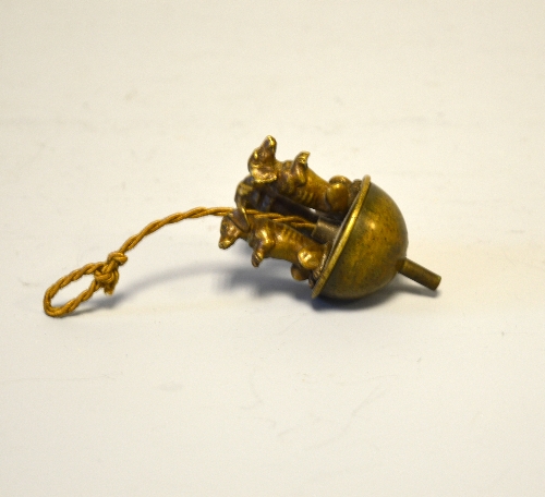 THREE BRONZE FIGURES OF BEGGING DACHSHUNDS, mounted as a bell pull, height approximately 4.5cm